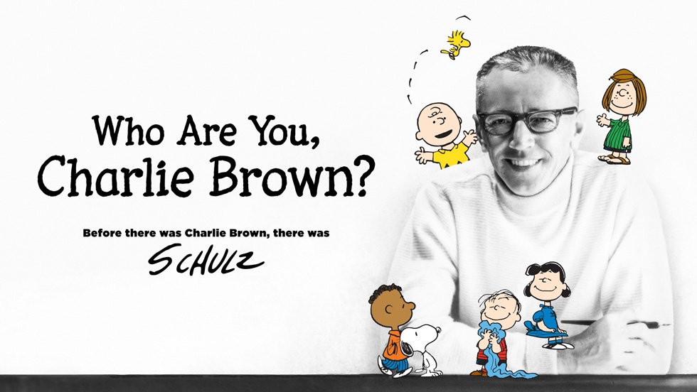Charles M. Schulz pictured with his beloved Peanuts characters in "Who Are You, Charlie Brown?,” premiering on Apple TV+ on Friday, June 25.