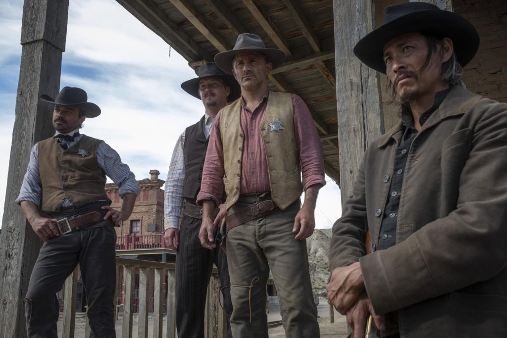 Dominic Cooper as Arthur McCoy, Ivan Shaw as Kurt, Daniel Caltagirone as Henry Longines, Benjamin Stender as Nathan - That Dirty Black Bag _ Season 1, Episode 1 - Photo Credit: Stefano C. Montesi/AMC+