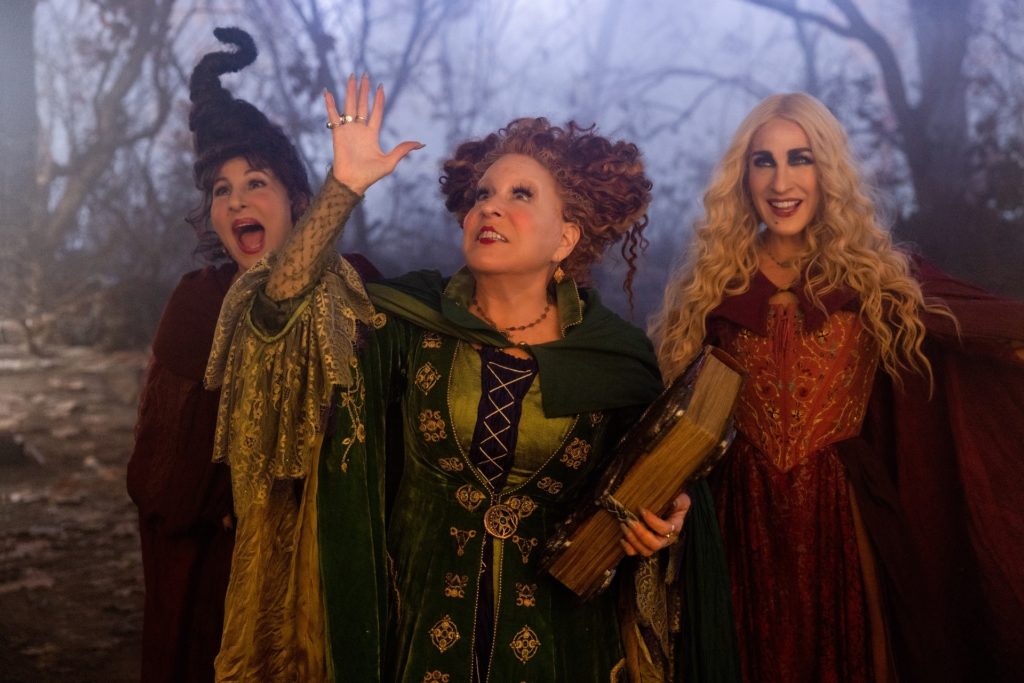 HOCUS POCUS 2 Kathy Najimy as Mary Sanderson, Bette Midler as Winifred Sanderson, and Sarah Jessica Parker as Sarah Sanderson in Disney's live-action HOCUS POCUS 2, exclusively on Disney+. Photo by Matt Kennedy. © 2022 Disney Enterprises, Inc. All Rights Reserved.