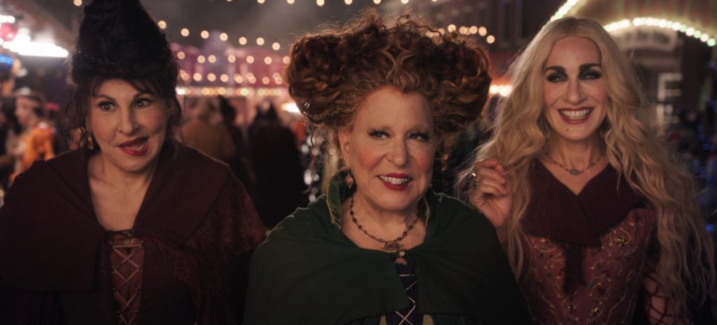 HOCUS POCUS 2 (L-R): Kathy Najimy as Mary Sanderson, Bette Midler as Winifred Sanderson, and Sarah Jessica Parker as Sarah Sanderson in Disney's live-action HOCUS POCUS 2, exclusively on Disney+. Photo courtesy of Disney Enterprises, Inc. © 2022 Disney Enterprises, Inc. All Rights Reserved.