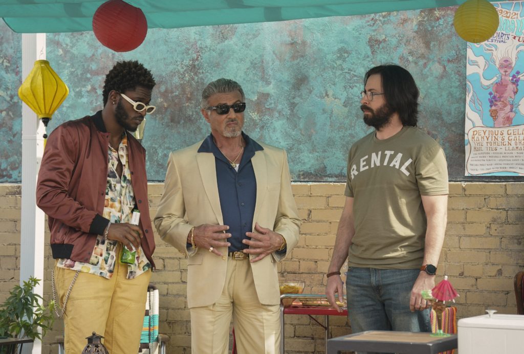 Jay Will as Tyson, Sylvester Stallone as Dwight Manfredi, and Martin Starr as Bodhi of the Paramount+ original series TULSA KING. Photo Cr: Brian Douglas/Paramount+. © 2022 Viacom International Inc. All Rights Reserved.